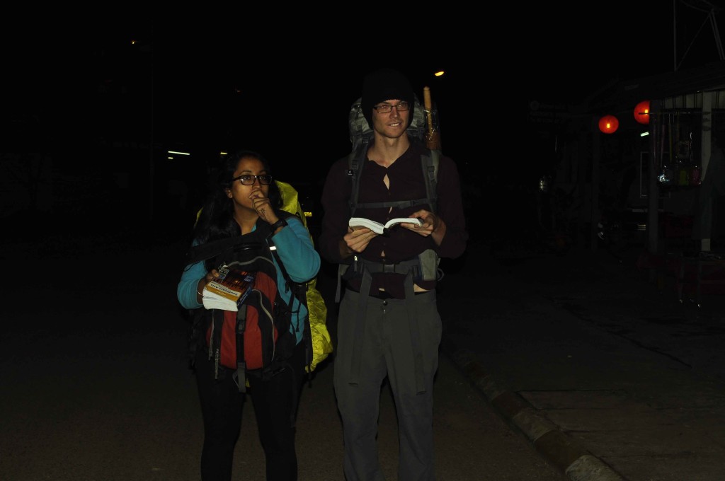 Comparing notes, Andrew & Ishwinder with our guide books